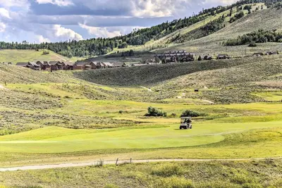 a golf course in the middle of a mountain at Half-Mi to Skiing Gorgeous Granby Ranch Home! in Granby