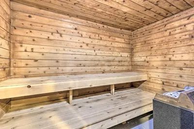 a wooden sauna with a bench in it at Easy Ski Shuttle Access! Winter Park Mtn Getaway in Winter Park