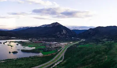 an aerial view of a city and a lake and mountains at Frisco Mountainside Retreat: Walk Downtown in Frisco