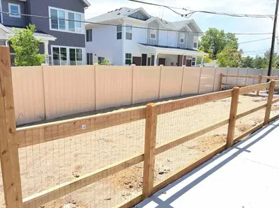 a wooden fence in front of a house at Charming 2 bed in Westminster in Westminster