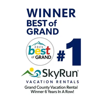 a logo for the winner best of best of grand at Trailhead Lodge 621 condo in Winter Park
