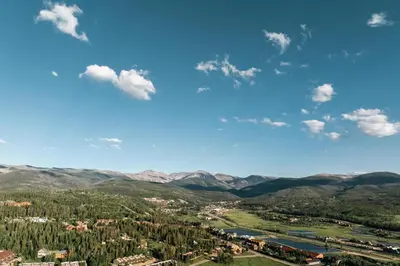 a view of a valley with mountains and a town at New MTN Retreat - Hot Tub - Deck Views - Fraser in Fraser