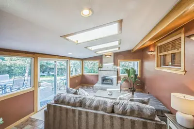 a living room with a couch and a fireplace at Bright & Cozy House Centennial Littleton 4 Bed 3 Bath in Centennial