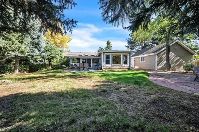 a small house with a patio and a yard at Bright & Cozy House Centennial Littleton 3 Bed 3 Bath in Centennial