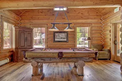 a room with a pool table in a cabin at 6507 Settlers Creek Townhomes townhouse in Keystone