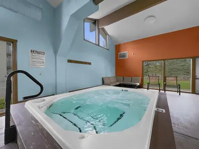 a jacuzzi tub in a room at A105 Lake Cliffe condo in Dillon
