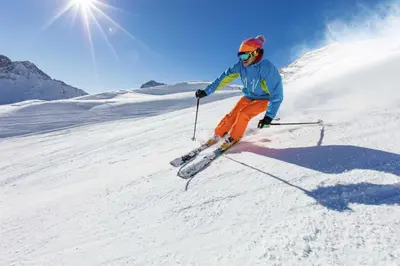 a person is skiing down a snow covered slope at Aspen Meadows F-304, 0014 in Granby