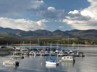 a bunch of boats are docked in a harbor at Aspen Meadows F-304, 0014 in Granby