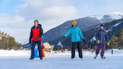 a group of three people standing in the snow at Luxury Home - Sleeps 10 - Fireplace & Mountain View condo in Keystone