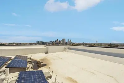 a rooftop with solar panels on the roof at 2880 Modern Lifestyle Loft at Espadin in Denver