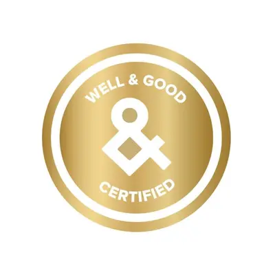 a gold button with a well and good certified symbol at 2880 Modern Lifestyle Loft at Espadin in Denver