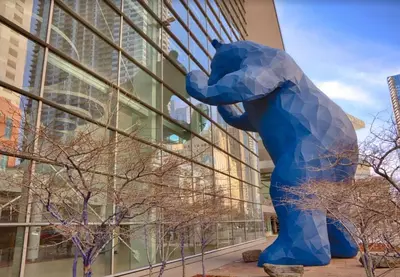 a large blue bear statue in front of a building at Cozy Lower Unit Retreat in Denver in Denver