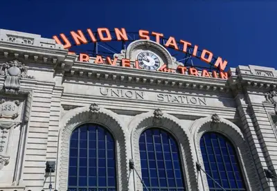 a building with a union station sign and a clock on it at Cozy Lower Unit Retreat in Denver in Denver