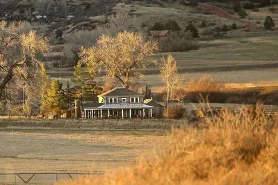a house in the middle of a field at Western-Style Ranch Getaway for Two Guests near Fort Collins, Colorado in Livermore