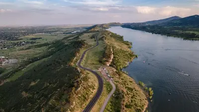 an aerial view of a road on an island in the water at Campus West Nest - King Bed, Walk to CSU in Fort Collins