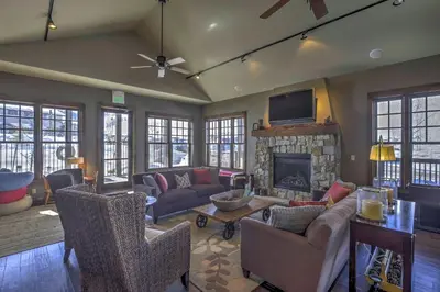 a living room with a couch and a fireplace at Granby Ranch Escape Shuttle to the Slopes! in Granby