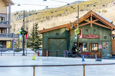 an ice skating rink in front of a building at Expedition Station 8574 in Keystone