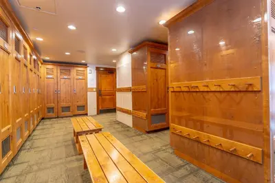 a locker room with wooden lockers and benches at Lone Eagle 3024 in Keystone