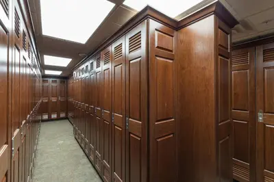 a row of wooden lockers in a dressing room at Dakota Lodge 8512 in Keystone