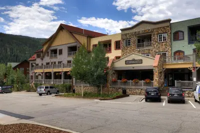 a town with cars parked in a parking lot at Expedition Station 8581 in Keystone