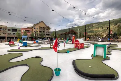 a playground with a bunch of miniature play areas at Expedition Station 8576 in Keystone