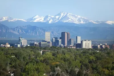 a city with mountains in the background with trees and buildings at New The Pine Getaway Lots of Room Hot Tub Views in Pine