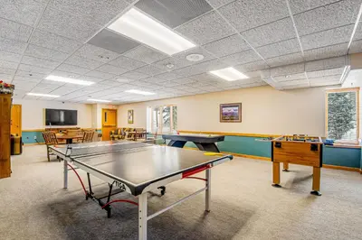 a ping pong room with a ping pong table at Iron Horse Resort 3063 in Winter Park