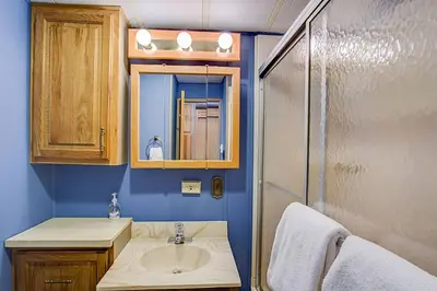a bathroom with a sink and a shower at #244 Tiger Run in Breckenridge
