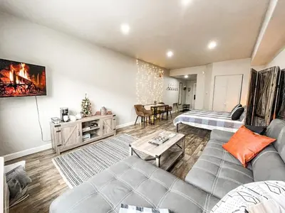 a living room with a couch and a table at #5075 Keystone in Keystone