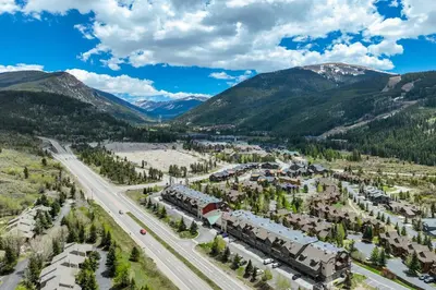 an aerial view of a resort in the mountains with a train at #5072 Keystone in Keystone