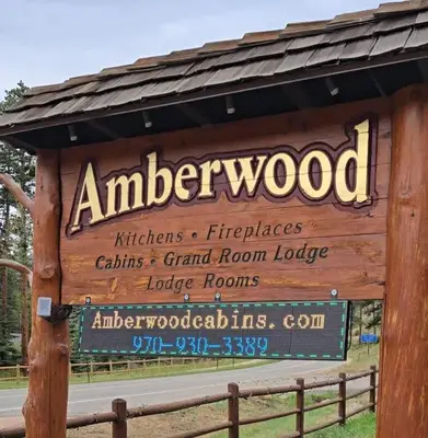 a sign at the entrance to aniger wood at Cabin 5- Private Cabin w King bed kitchen porch in Estes Park
