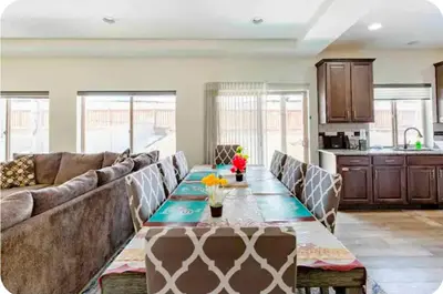 a living room with a couch and a table at Sweet stay near Denver airport in DEN