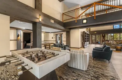 a large living room with a large fire pit at Springs Unit 8865 in Keystone