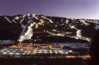 a ski resort on a mountain at night at Tennis Townhome Unit 1321 in Keystone