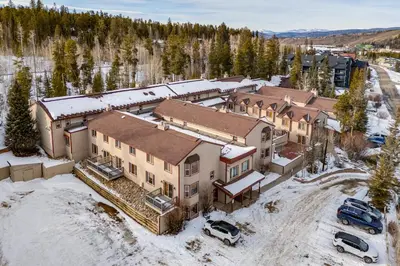 an aerial view of a large house in the snow at Walk to Main St! Ultimate Winter Park Getaway in Winter Park