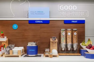 a grocery store with food items on a shelf at Holiday Inn Express & Suites Broomfield by IHG in Broomfield