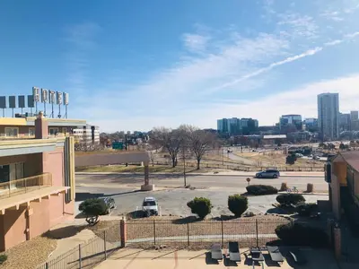 a view of a parking lot in a city at Budget Inn Denver Downtown in Denver