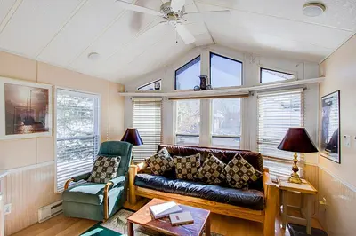 a living room with a couch and a chair at #84 in Breckenridge