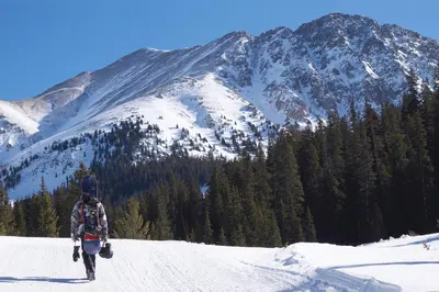 a person walking down a snow covered mountain at Solitude Station Home: Walk to Downtown in Frisco