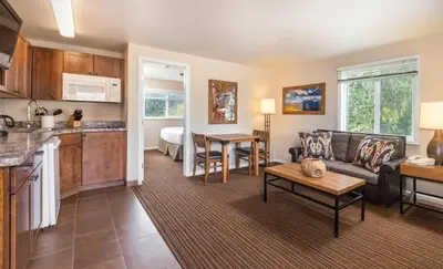 a living room with a couch and a table at WorldMark Estes Park in Estes Park