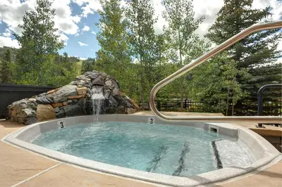 a hot tub with a water fountain at Updated 1Br Premier Condo At Black Bear Lodge- Kids Ski Free Condo in Keystone