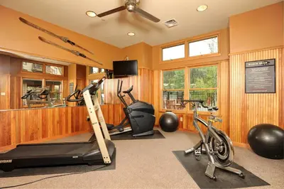 a gym with exercise equipment and two exercise bikes at Updated 1Br Premier Condo At Black Bear Lodge- Kids Ski Free Condo in Keystone
