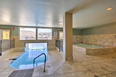 a large bathroom with a hot tub and a pool at The Inn at Silver Creek Resort Retreat with Balcony! in Granby