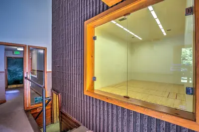 a room with a large glass window on a wall at Ski and Relax Fireside Frisco Gem with Resort Perks! in Frisco