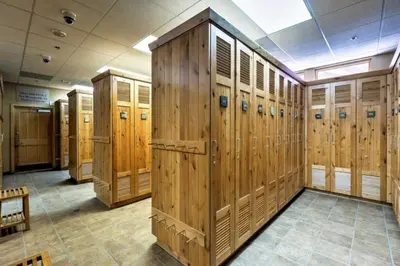 a row of wooden lockers in a room at Premier 2 Bedroom Mountain Condo In River Run Village With Expansive Mountain Views And Walking Distance To Ski Slopes in Keystone