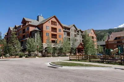 a large apartment building on the side of a street at Buffalo Lodge by Summit County Mountain Retreats in Keystone