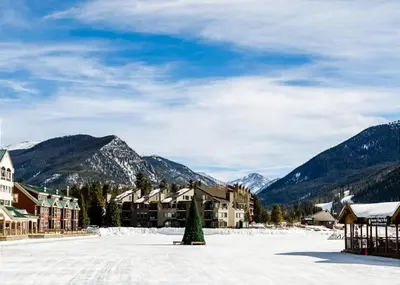 a resort in the mountains with snow on the ground at Jackpine Lodge by Summit County Mountain Retreats in Keystone