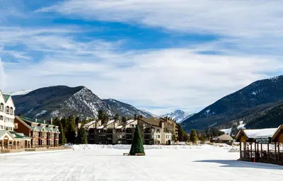 a resort in the mountains with snow on the ground at Tennis Townhome 1337 : 2 in Keystone