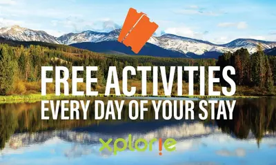 a picture of a lake with mountains and the words free activities every day of your at Iron Horse C5083 condo in Winter Park