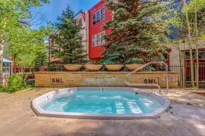 a hot tub in the backyard of a house at 8166 Silver Mill in Keystone